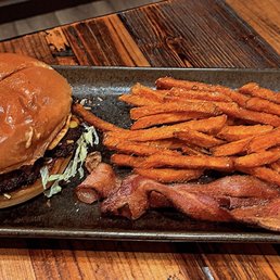Backyard BBQ with bacon on the side and sweet potato fries Backyard BBQ with bacon on the side and sweet potato fries