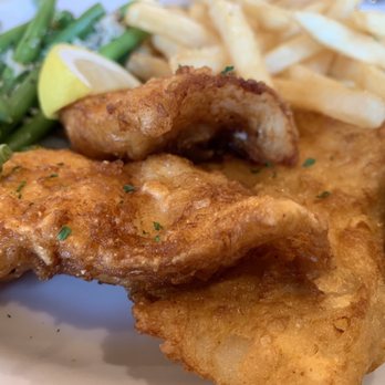 Woodland Grill - Fish and chips Entree fish is Cod - American Near Me - Newberry, Michigan