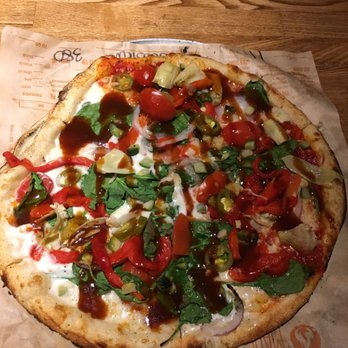 Blaze Pizza - My half white/ half spicy red veggie pizza! Don't forget the barbecue and olive oil drizzle. - Pizza Near Me - Davis, California Blaze Pizza - My half white/ half spicy red veggie pizza! Don't forget the barbecue and olive oil drizzle. - Pizza Near Me - Davis, California