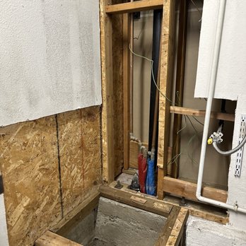 Gennaro's Plumbing - Water heater platform after demo was done. Ready for drywall patch job. - Plumbing Near Me Gennaro's Plumbing - Water heater platform after demo was done. Ready for drywall patch job. - Plumbing Near Me