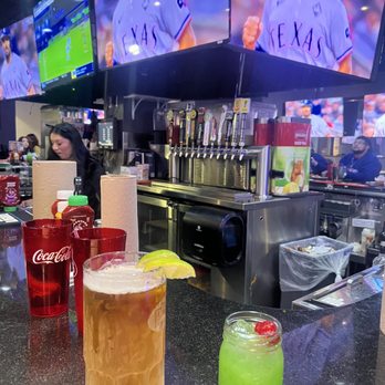 Pluckers Wing Bar - Greenville - Tall modelo and psychedelic frog - Chicken Wings Near Me - Dallas, Texas Pluckers Wing Bar - Greenville - Tall modelo and psychedelic frog - Chicken Wings Near Me - Dallas, Texas