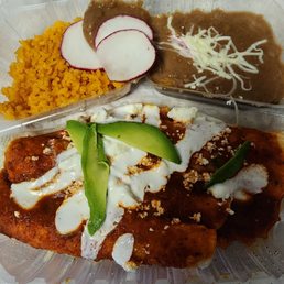 Cheese enchiladas with red sauce. No flavor at all and unripe avocado. Cheese enchiladas with red sauce. No flavor at all and unripe avocado.