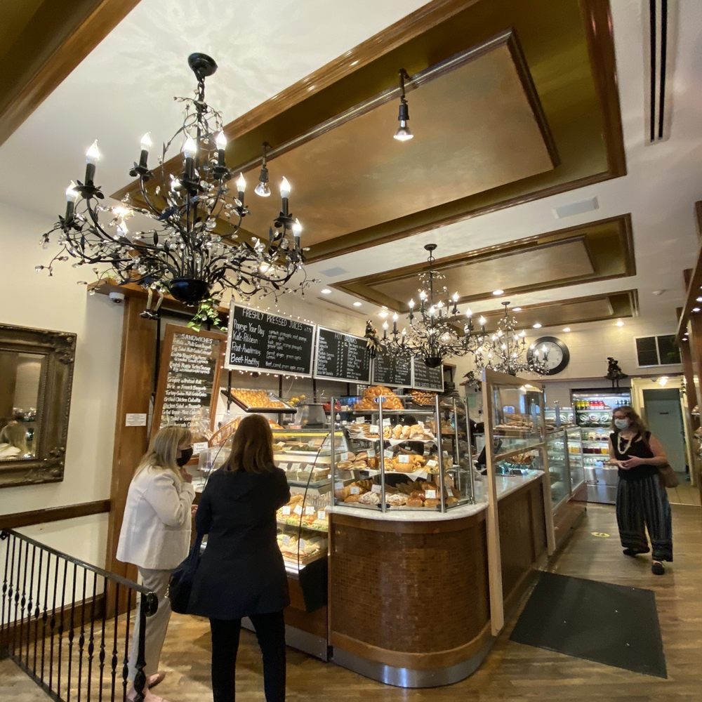 Martine's Fine Bake Shoppe - a woman standing in front of the counter - Bakeries Near Me - Scarsdale, New York Martine's Fine Bake Shoppe - a woman standing in front of the counter - Bakeries Near Me - Scarsdale, New York
