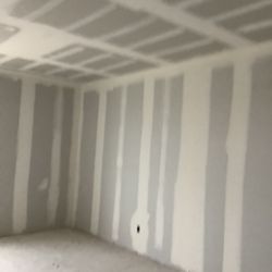 Juan Galaviz Remodeling - Room tape and bedding and texture