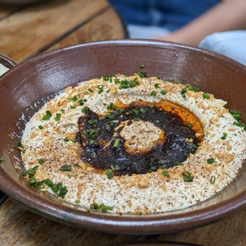 The Peacock - Hawaj Chile Hummus $18 (black garlic, chive) - Mediterranean Near Me - Austin, Texas The Peacock - Hawaj Chile Hummus $18 (black garlic, chive) - Mediterranean Near Me - Austin, Texas