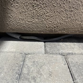 B&G Landscaping - Totally illegal. Tried to use grease nuts to attach 120 volts. This is for pillar lighting not sprinkler wire. - Landscaping Near Me