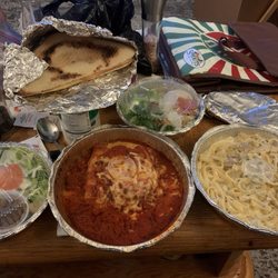 Rico’s Pizzeria - Our Valentine's dinner carry out. Lasagna and Fettuccini Alfredo with Chicken entrées.