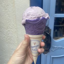 Blueberry yogurt ice cream in lavender cone Blueberry yogurt ice cream in lavender cone