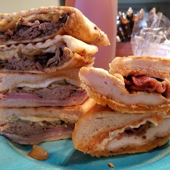 Millburn Deli - Cubano at the bottom, Wild Bull on top, Godfadda to the right and Iced Tea @Millburn Deli. All worthy. - Delis Near Me - Millburn, New Jersey Millburn Deli - Cubano at the bottom, Wild Bull on top, Godfadda to the right and Iced Tea @Millburn Deli. All worthy. - Delis Near Me - Millburn, New Jersey