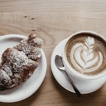 Olympia Coffee - a cup of coffee and a croissant - Coffee Roasteries Near Me - Olympia, Washington Olympia Coffee - a cup of coffee and a croissant - Coffee Roasteries Near Me - Olympia, Washington