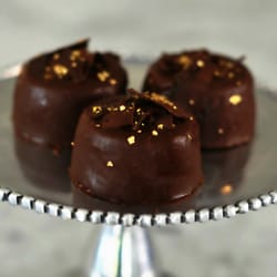The Dark Chocolate Bakery - Flourless Decadence mini cakes. Topped with chocolate shavings and edible gold! The perfect gift.