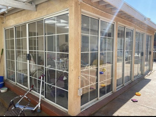 PATIO ENCLOSURE REMODEL - This is a patio enclosure in San Pedro that heavily required a remodel. The existing patio doors allowed for no insulation, the doors also did not open properly, the walls were not finished and there was, little too, no lighting. During the remodel we were able to use the wall space available to add windows and drywall to allow for more furniture/essentials to be placed inside. Client is now happy that his family can sit comfortably and can finally operate his doors/windows. PATIO ENCLOSURE REMODEL - This is a patio enclosure in San Pedro that heavily required a remodel. The existing patio doors allowed for no insulation, the doors also did not open properly, the walls were not finished and there was, little too, no lighting. During the remodel we were able to use the wall space available to add windows and drywall to allow for more furniture/essentials to be placed inside. Client is now happy that his family can sit comfortably and can finally operate his doors/windows.