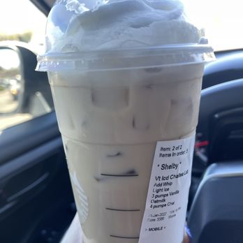 Starbucks - a hand holding a cup of iced coffee - Coffee & Tea Near Me - Fountain Hills, Arizona Starbucks - a hand holding a cup of iced coffee - Coffee & Tea Near Me - Fountain Hills, Arizona
