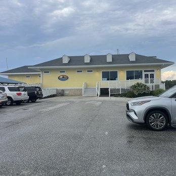 Surf Rider - Outside View from parking lot in Marina - Seafood Near Me - Poquoson, Virginia Surf Rider - Outside View from parking lot in Marina - Seafood Near Me - Poquoson, Virginia