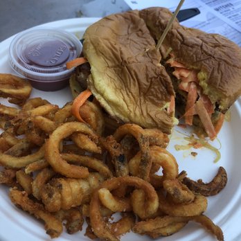 Rudyard's - Buffalo chicken sandwich with curly fries - Music Venues Near Me - Houston, Texas Rudyard's - Buffalo chicken sandwich with curly fries - Music Venues Near Me - Houston, Texas