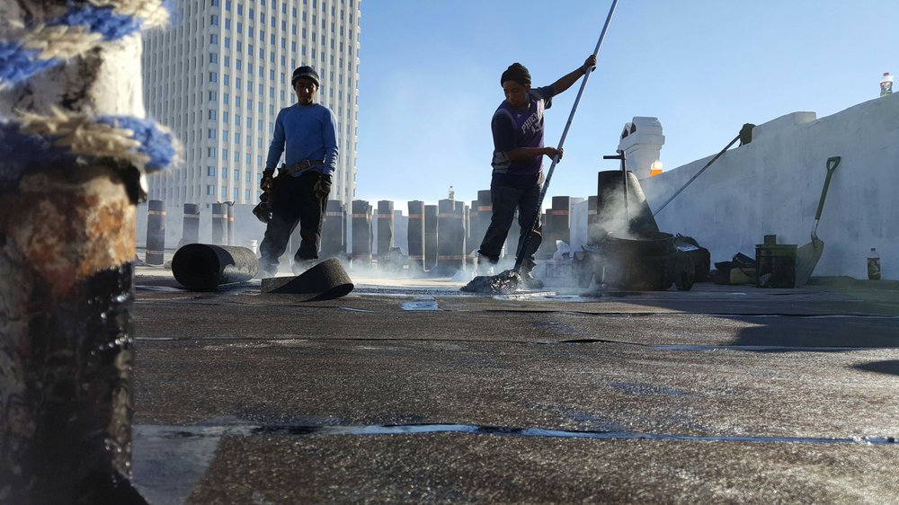 Slide of Ernie Smith & Sons Roofing