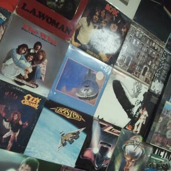 Z Brothers Pizza - The wall is covered with old vinyl record jackets. - Pizza Near Me - Centerville, Utah Z Brothers Pizza - The wall is covered with old vinyl record jackets. - Pizza Near Me - Centerville, Utah
