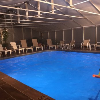 Refuge Inn - Pool at night - Hotels Near Me - Chincoteague Island, Virginia Refuge Inn - Pool at night - Hotels Near Me - Chincoteague Island, Virginia