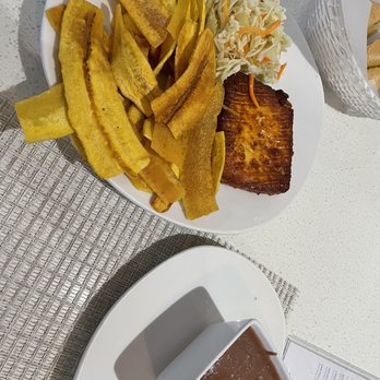 Madrono Restaurant - Fried cheese, coleslaw and fried plantains with side order of their smashed beans...sooo good - Latin American Near Me - Miami, Florida Madrono Restaurant - Fried cheese, coleslaw and fried plantains with side order of their smashed beans...sooo good - Latin American Near Me - Miami, Florida