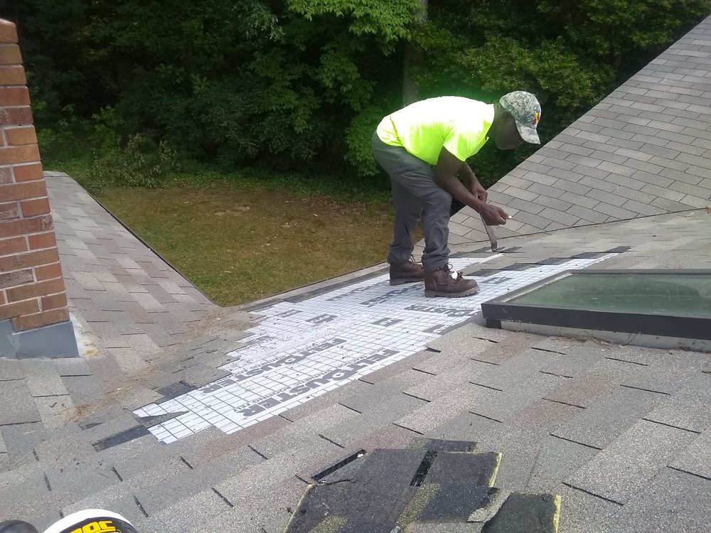 Slide of Dad & Son Roofing