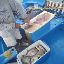 Rocky Point Fishing Club - Noah cleaning our haul