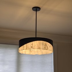 King Electrical Services - New chandelier installed in a Greensboro home's breakfast nook! Warm Edison bulbs highlight the natural detail of the alabaster stone slats.