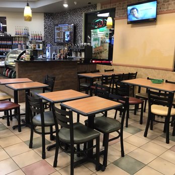 Chevron - Standing at the subway sandwich counter, the view of the seating area & Rare Earth Coffee bar - Gas Stations Near Me - Madera, California Chevron - Standing at the subway sandwich counter, the view of the seating area & Rare Earth Coffee bar - Gas Stations Near Me - Madera, California