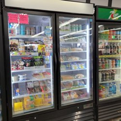 Road Trip Oasis Perry - Cheese, pickles, sandwiches, chip dip, and much more! Snacks and lunch on the go!