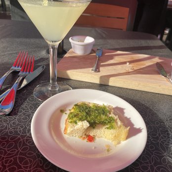 Toscanos - Cucumber Basil Martini & house bread with pesto spread. - Italian Near Me - Puyallup, Washington Toscanos - Cucumber Basil Martini & house bread with pesto spread. - Italian Near Me - Puyallup, Washington
