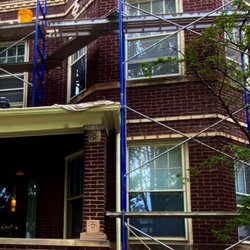Gralak Tuckpointing Concrete and Waterproofing - 2Flat in Chicago.Replacement the iron beams with insulation the window flashing systems at the active water leaks walls.