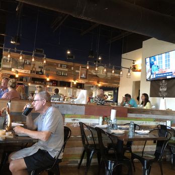 Bone Hook Brewing Company - Seating inside to keep cool! - Breweries Near Me - Naples, Florida Bone Hook Brewing Company - Seating inside to keep cool! - Breweries Near Me - Naples, Florida
