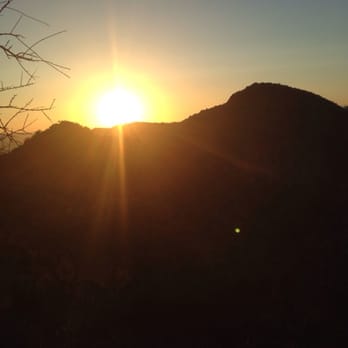 Griffith Observatory - Back view from the top of the Hollywood Sign hike - sun going down - Observatories Near Me - Los Angeles, California Griffith Observatory - Back view from the top of the Hollywood Sign hike - sun going down - Observatories Near Me - Los Angeles, California