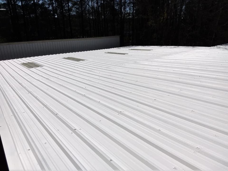 Slide of K & C Seamless Roofing