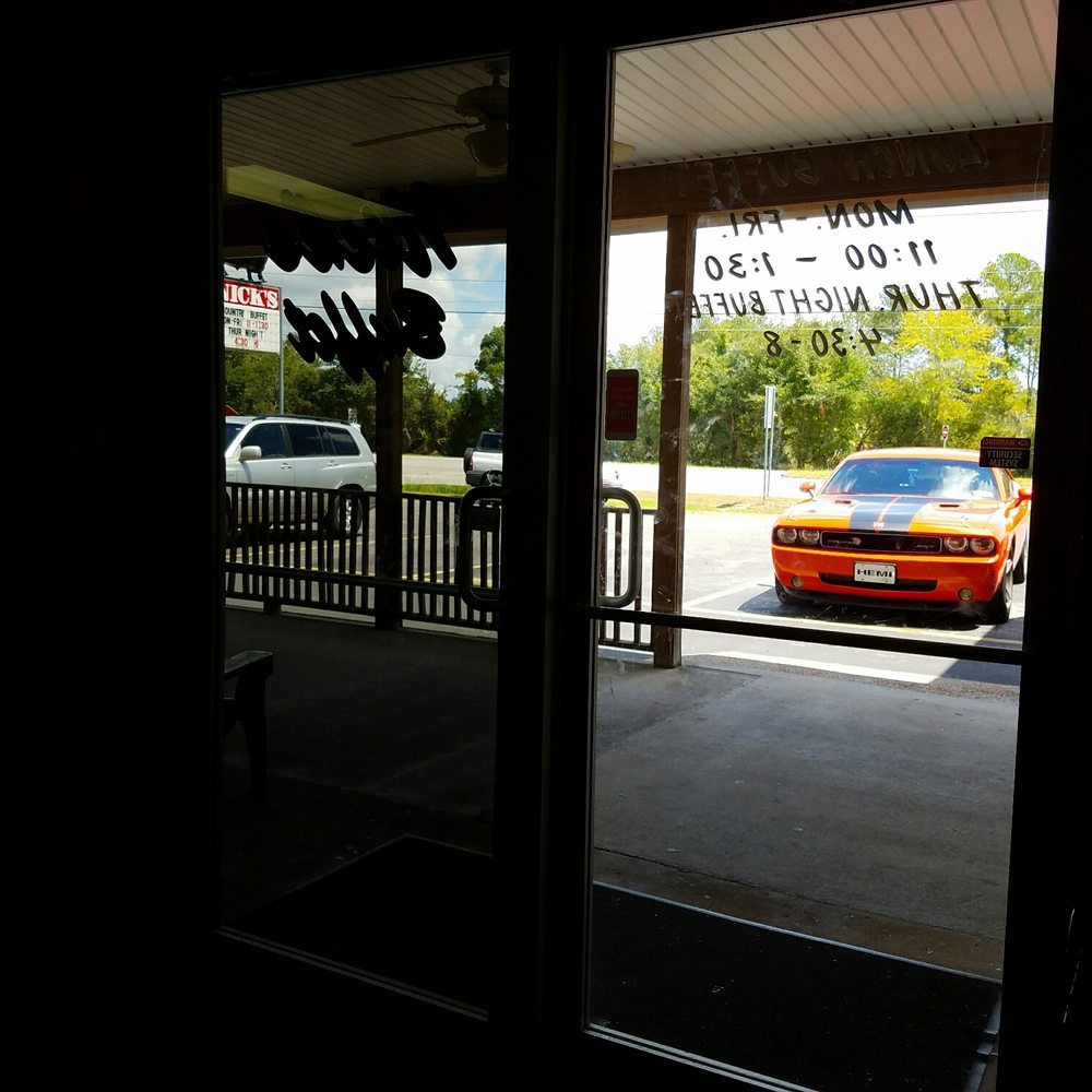 Nick's Buffet - a car parked in a parking lot - Buffets Near Me - Brunswick, Georgia