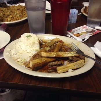 Tineo Peruvian Cafe - Lomo saltado (which is a beef stir fry) with maracuya (passion fruit drink) and fried yucca. On friends' plates: Arroz chaufa - Peruvian Near Me - Richardson, Texas Tineo Peruvian Cafe - Lomo saltado (which is a beef stir fry) with maracuya (passion fruit drink) and fried yucca. On friends' plates: Arroz chaufa - Peruvian Near Me - Richardson, Texas