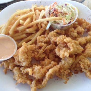 King Neptune Restaurant - island style cracked conch - Seafood Near Me - Stuart, Florida King Neptune Restaurant - island style cracked conch - Seafood Near Me - Stuart, Florida