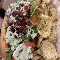 The Dogfather II - Tomato, Arugula, Avocado Ranch Sauce, Bacon wrapped Hot Dog.... this was called the BBLT.  with a side of Fried Pickles.  Mmm mmm good.