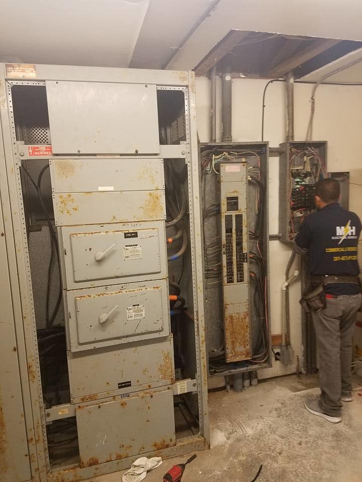 Slide of MH Electrical Services