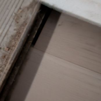 JM Improvements - Bad cuts and uneven by the door - Handyman Near Me