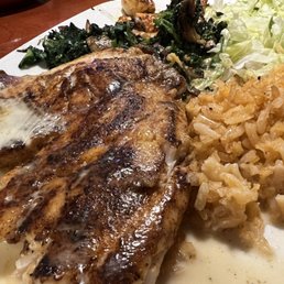 Fish with shrimp, rice and mushrooms.