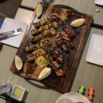 The Olive Restobar - I ordered these items (rice, chicken, and salmon) separately. This presentation is cute. - Mediterranean Near Me - Downey, California