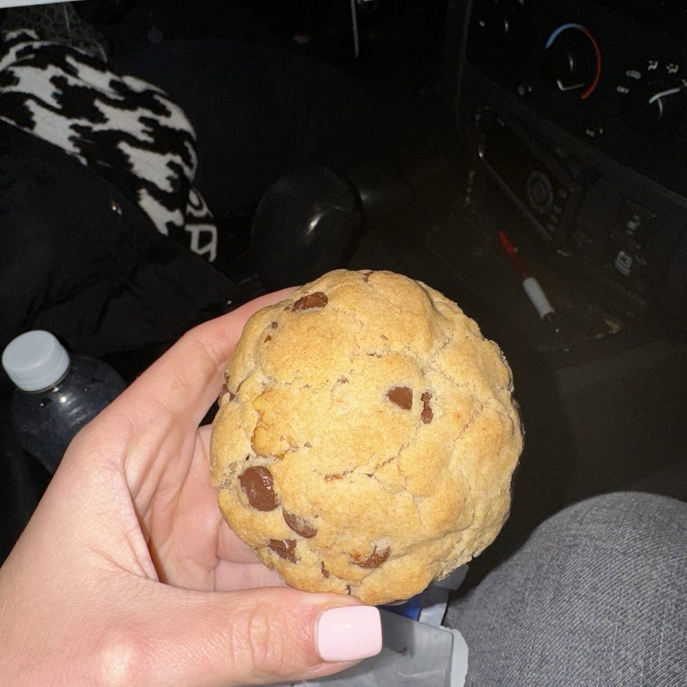 Levain Bakery - a hand holding a chocolate chip cookie - Bakeries Near Me - Long Island City, New York Levain Bakery - a hand holding a chocolate chip cookie - Bakeries Near Me - Long Island City, New York