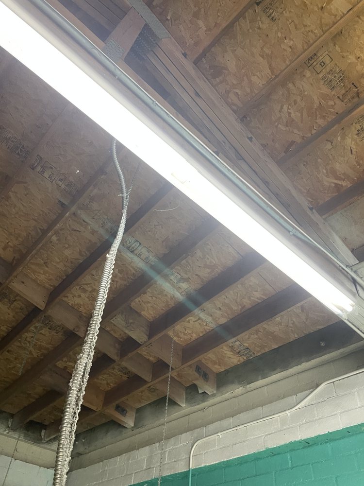 Slide of Electricians On A Mission