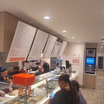 Chicken Kitchen - customers ordering food at the counter - Chicken Shop Near Me - Miami, Florida Chicken Kitchen - customers ordering food at the counter - Chicken Shop Near Me - Miami, Florida