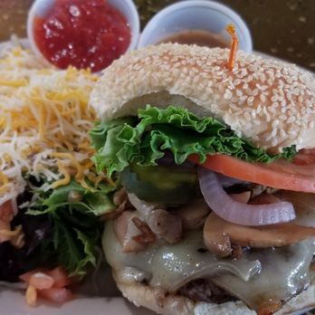 Rudi's - Swiss cheese and mushroom burger with salad. - Sports Bars Near Me - Patchogue, New York