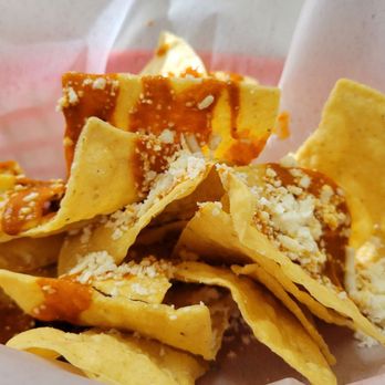 Oaxaca De Mis Amores - Complimentary chips Oaxaca style with red mole and cheese. - Mexican Near Me - Riverside, California