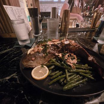 The Husky - Whole Red Fish Almondine with green beans. I would definitely recommend this. It was so delicious. - Burgers Near Me - New Orleans, Louisiana The Husky - Whole Red Fish Almondine with green beans. I would definitely recommend this. It was so delicious. - Burgers Near Me - New Orleans, Louisiana