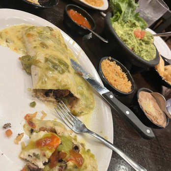 L & J Cafe - Steak burrito smothered in con queso. It was TASTY. Tender steak cuts - Mexican Near Me - El Paso, Texas L & J Cafe - Steak burrito smothered in con queso. It was TASTY. Tender steak cuts - Mexican Near Me - El Paso, Texas
