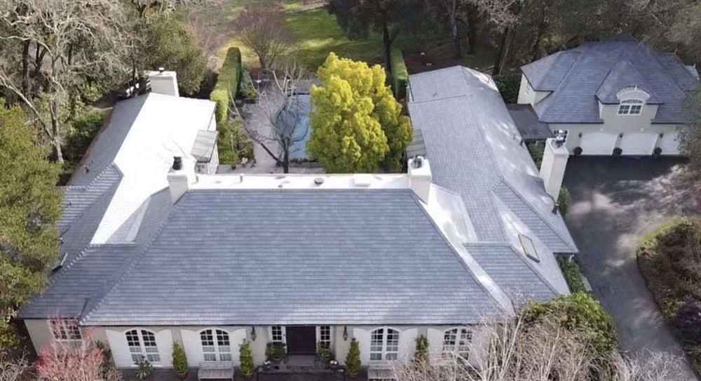 Slide of Exclusively Roofing