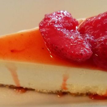 Moore's Dairy Creme - a piece of cheesecake with raspberries on top - Ice Cream & Frozen Yogurt Near Me - Newark, Arkansas Moore's Dairy Creme - a piece of cheesecake with raspberries on top - Ice Cream & Frozen Yogurt Near Me - Newark, Arkansas